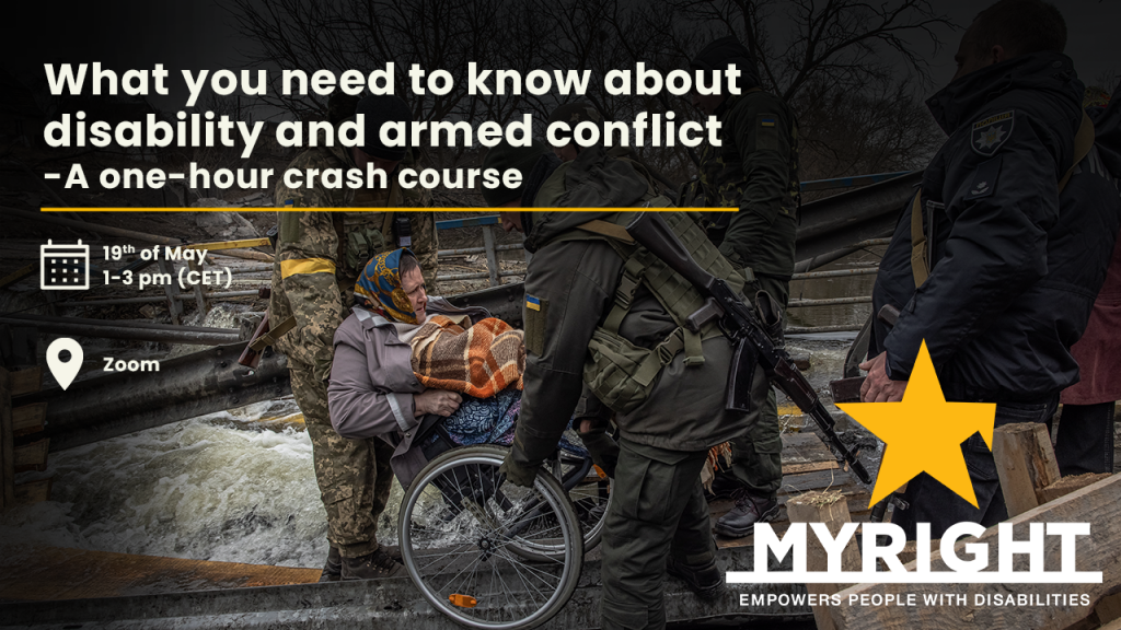 Soldados ucranianos llevan a una mujer en silla de ruedas por un puente roto